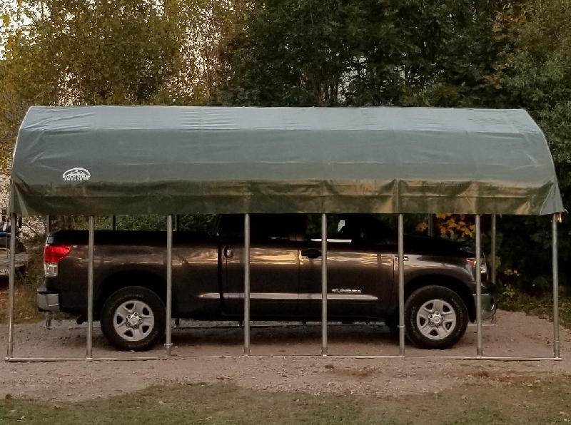 a Rock Solid Shelters canopy model keeping you and your vehicle covered
